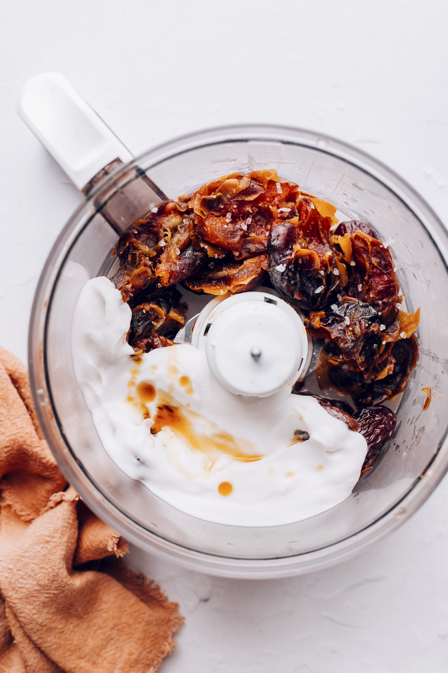 Dates, coconut cream, vanilla, and sea salt in a food processor