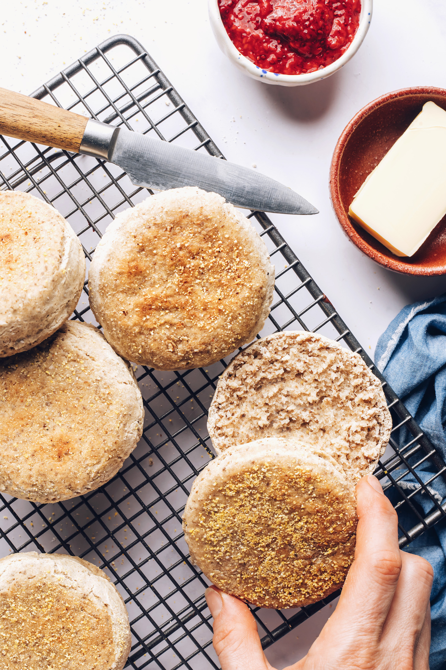 Gluten-free English muffins on a cooling rack