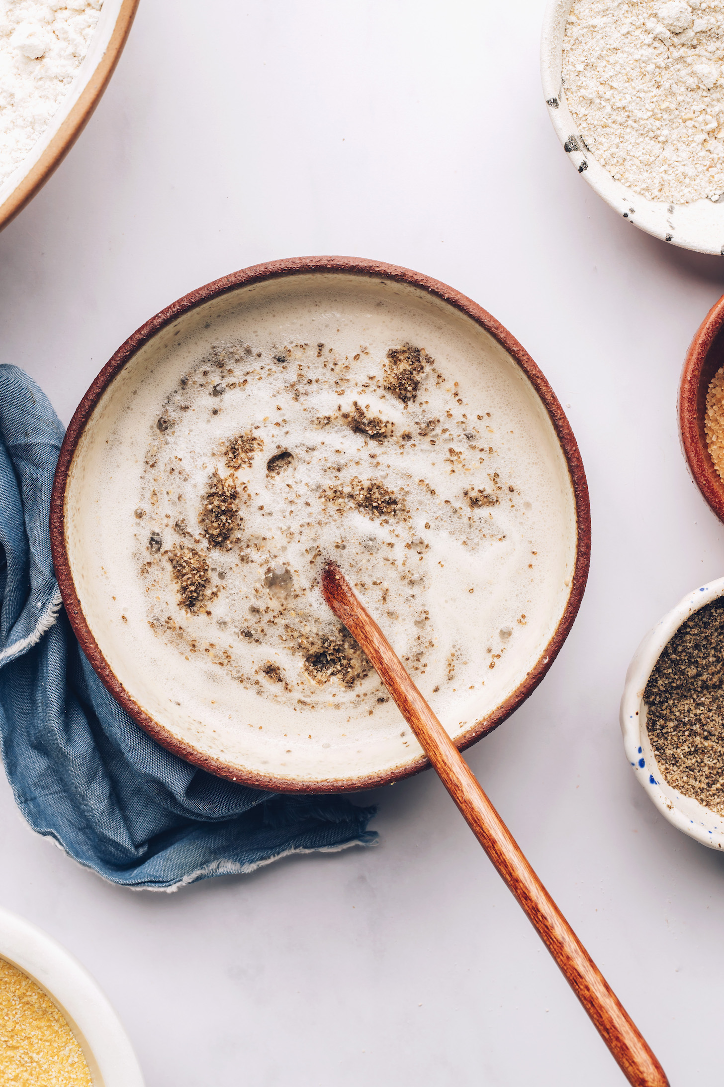 Bowl with activated yeast and ground chia seeds