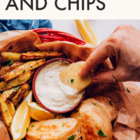 Basket of vegan and gluten-free "fish" and chips with a side of vegan tartar sauce