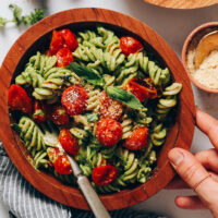 Overhead shot of a bowl of creamy vegan pesto pasta