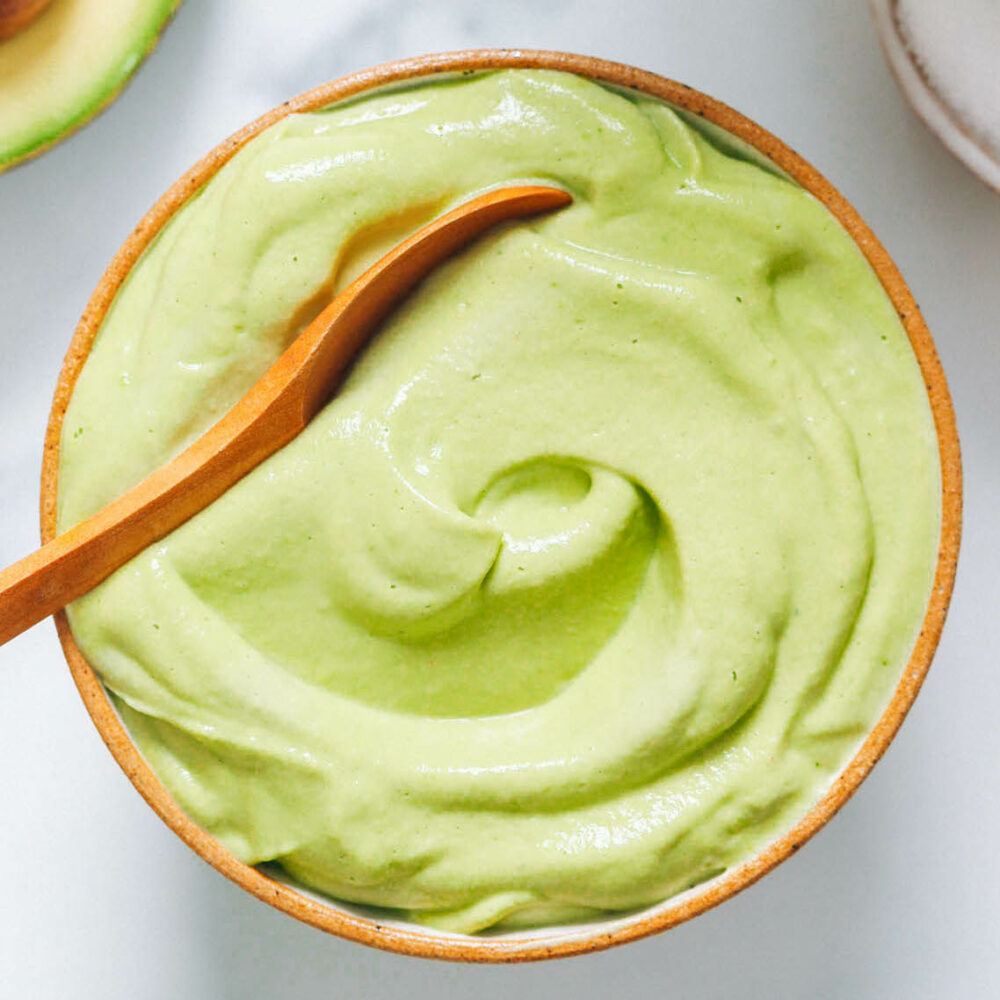 Overhead shot of a bowl of avocado crema