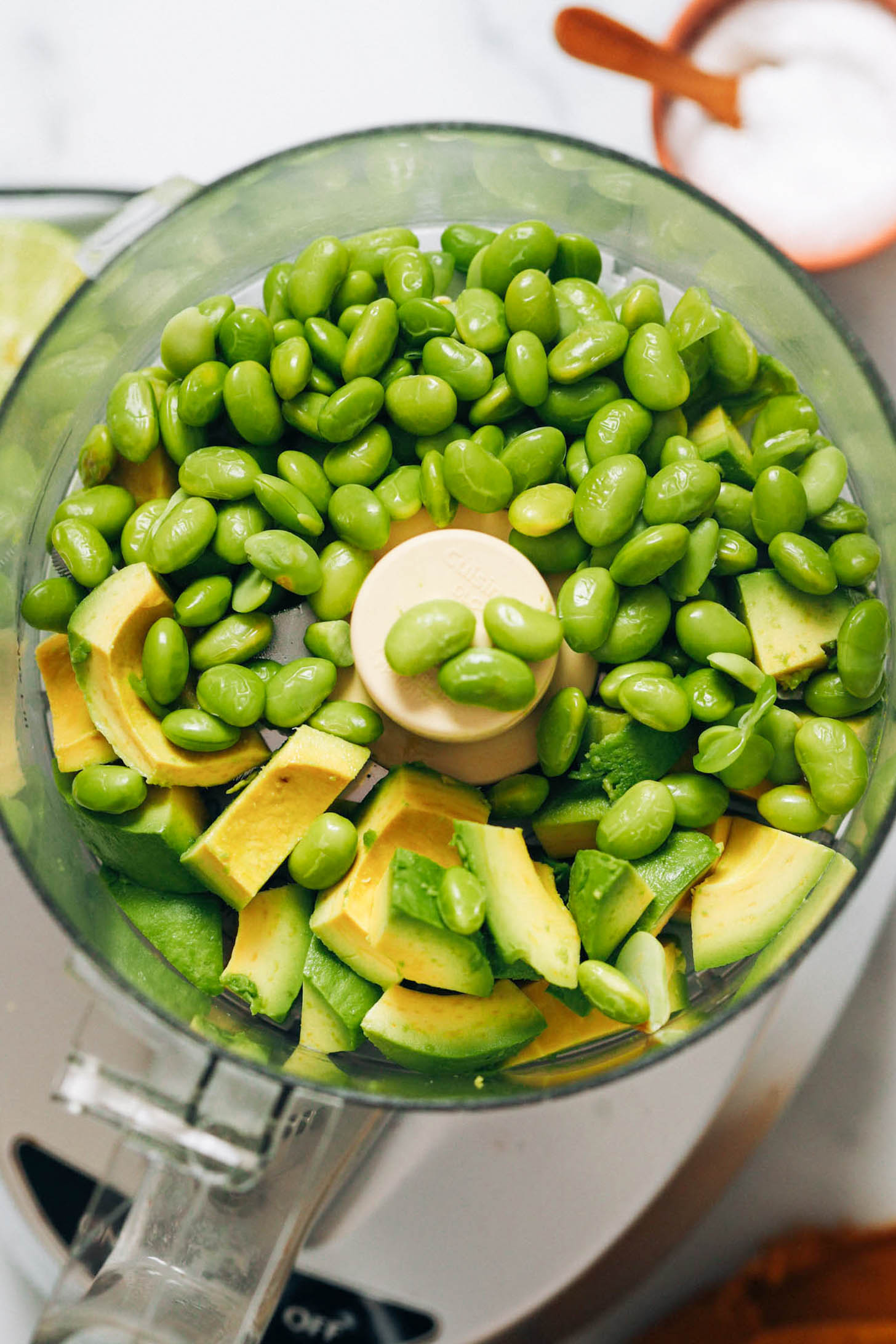 Edamame and avocado chunks in a food processor