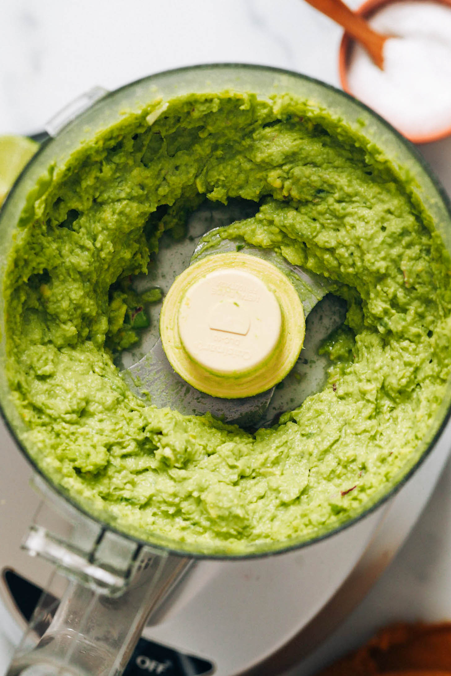 Creamy guacamole in a food processor