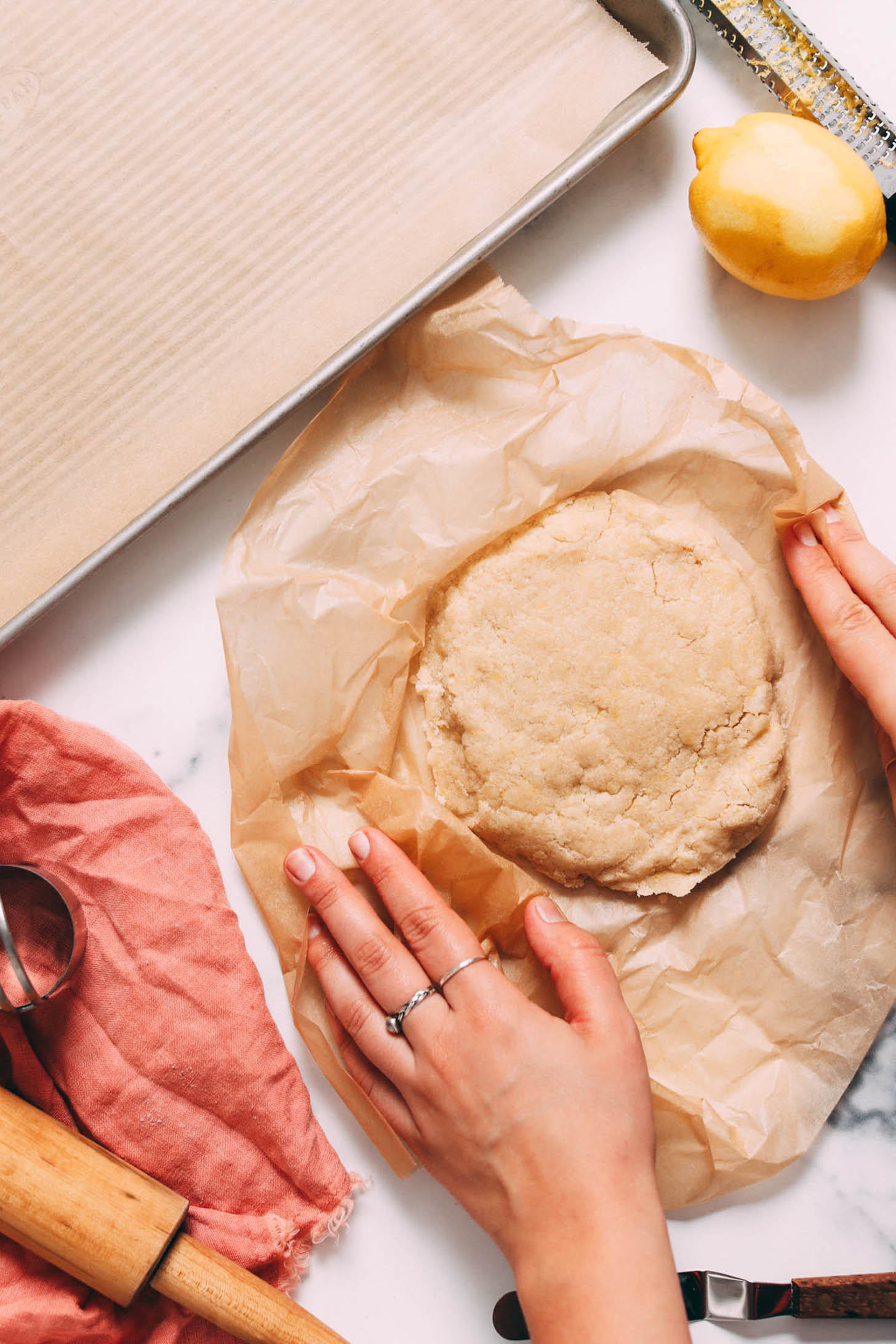 Disc of cookie dough on a piece of parchment paper