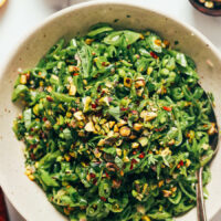 Serving plate piled high with snap pea salad