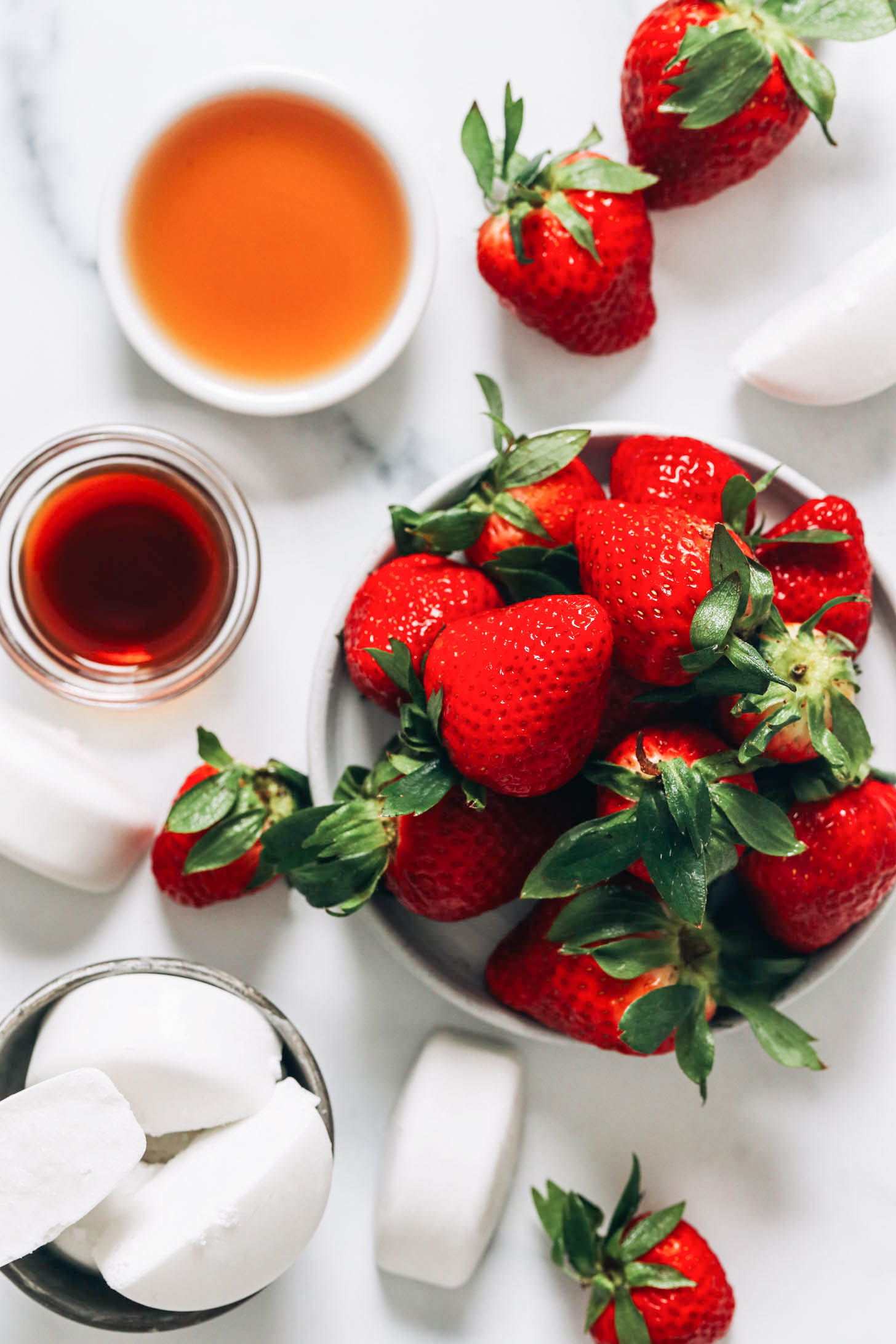 Maple syrup, vanilla, strawberries, and coconut milk ice cubes