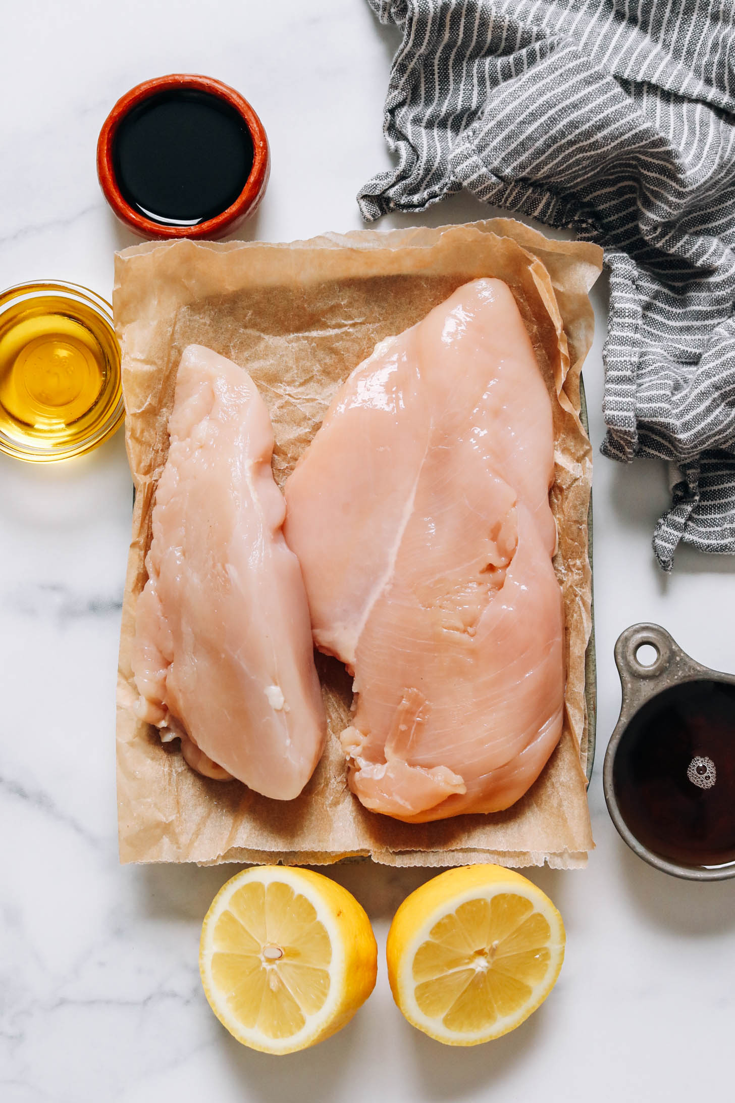 Chicken breasts, olive oil, coconut aminos, maple syrup, and lemons