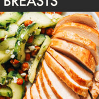 Plate of easy baked chicken breast with a salad on the side