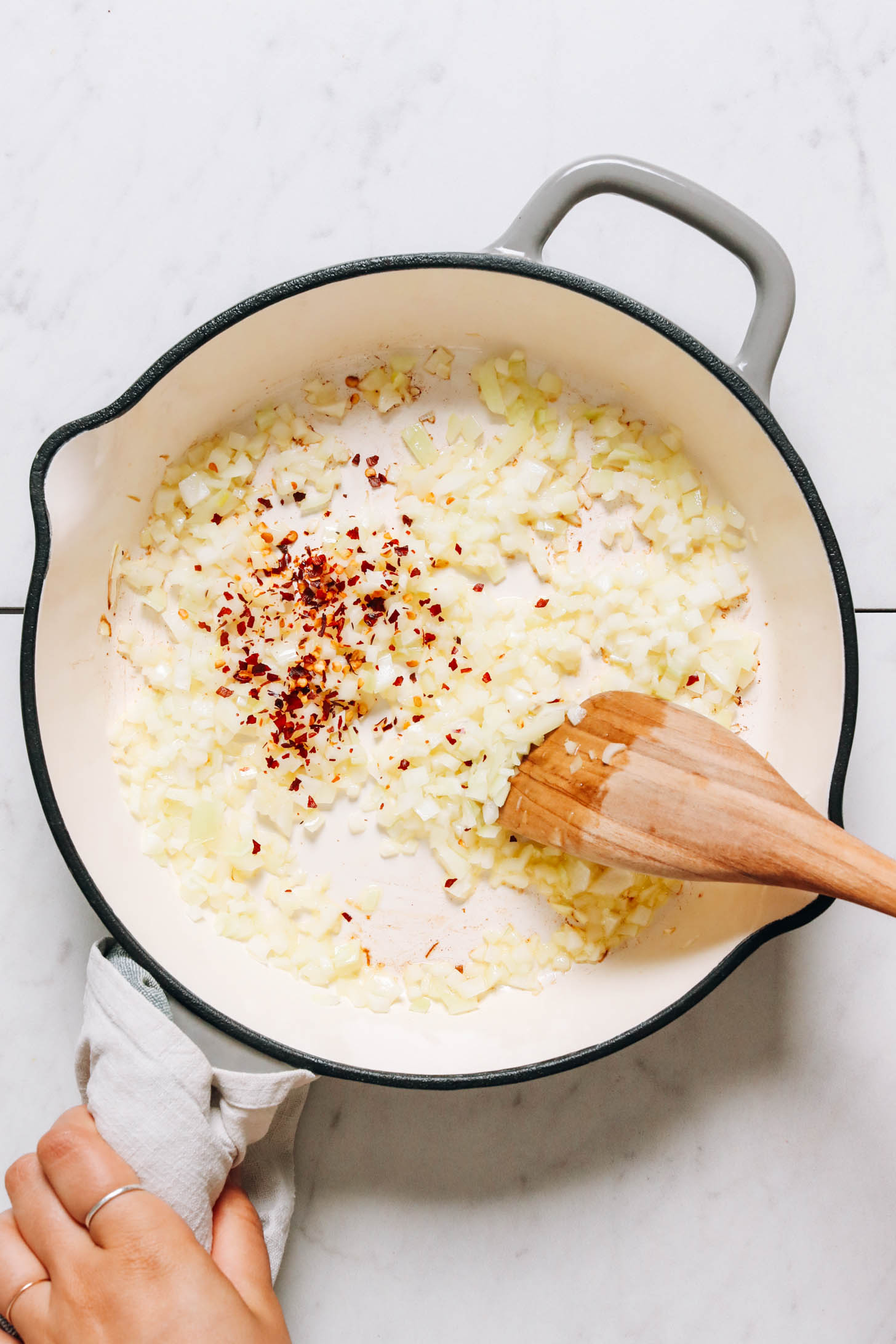 Sautéing onion, garlic, and red pepper flakes