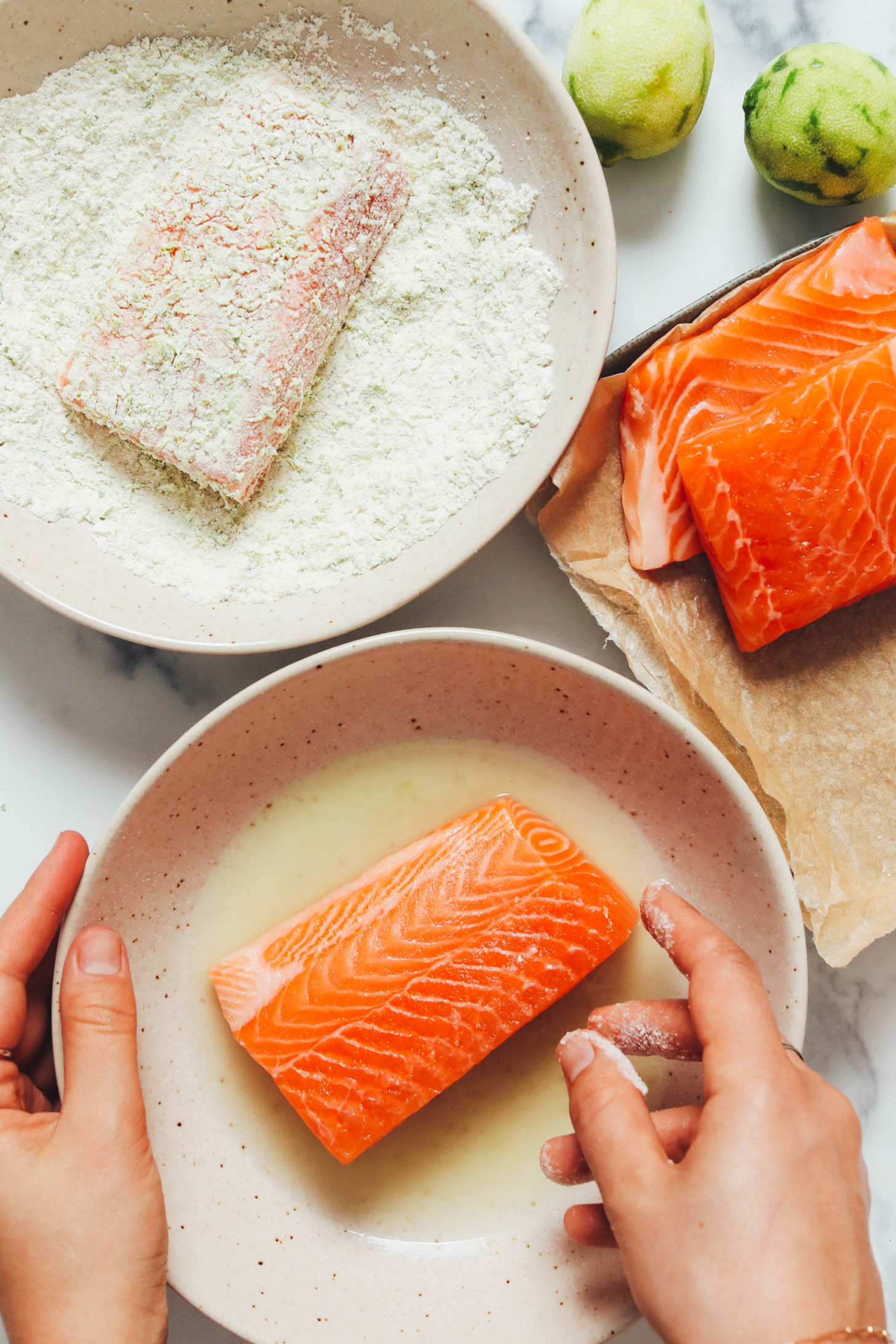 Salmon filets dipped in lime juice and a lime breading