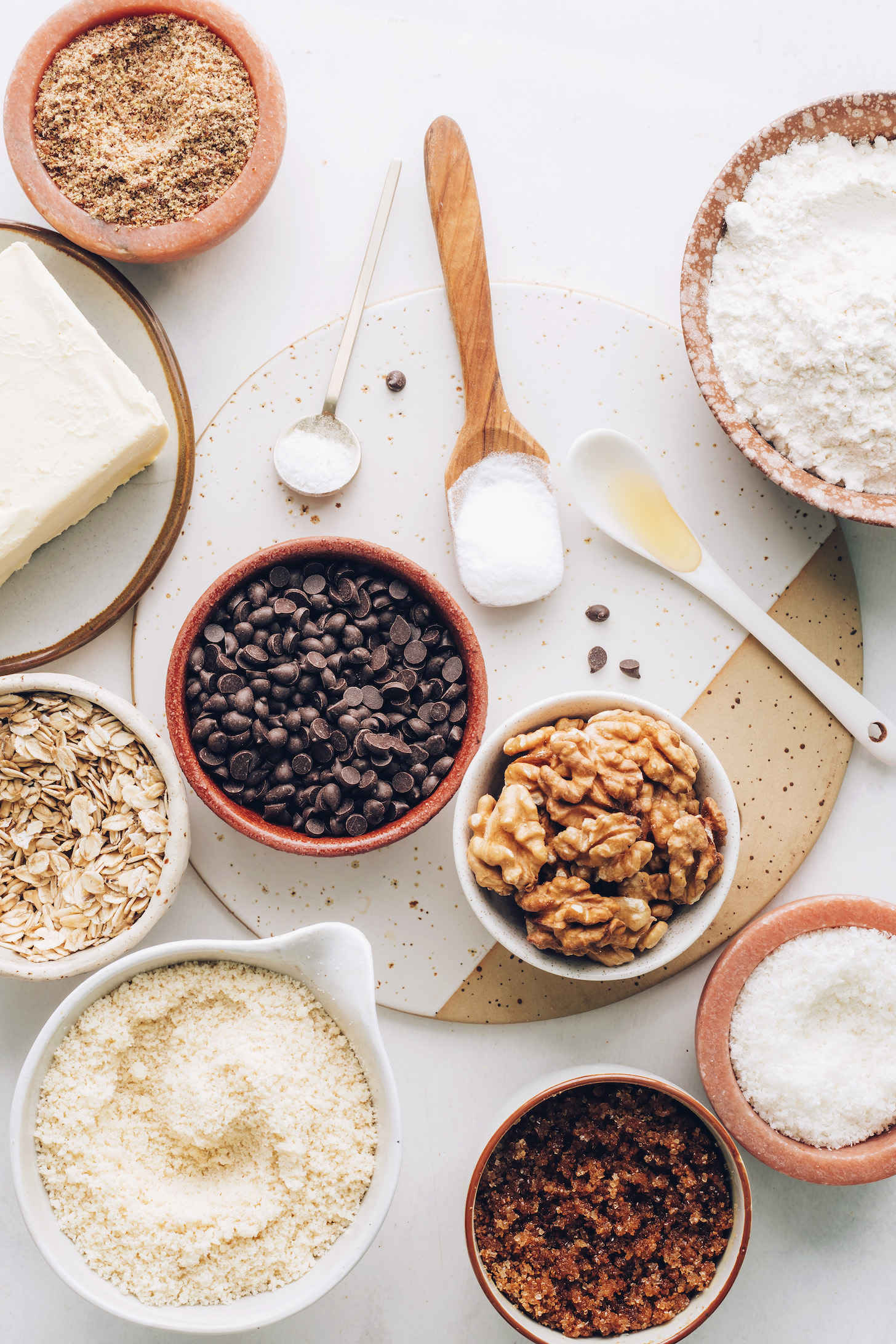 Flaxseed meal, vegan butter, oats, almond flour, brown sugar, coconut, walnuts, chocolate chips, vanilla, salt, baking soda, and gluten-free flour blend