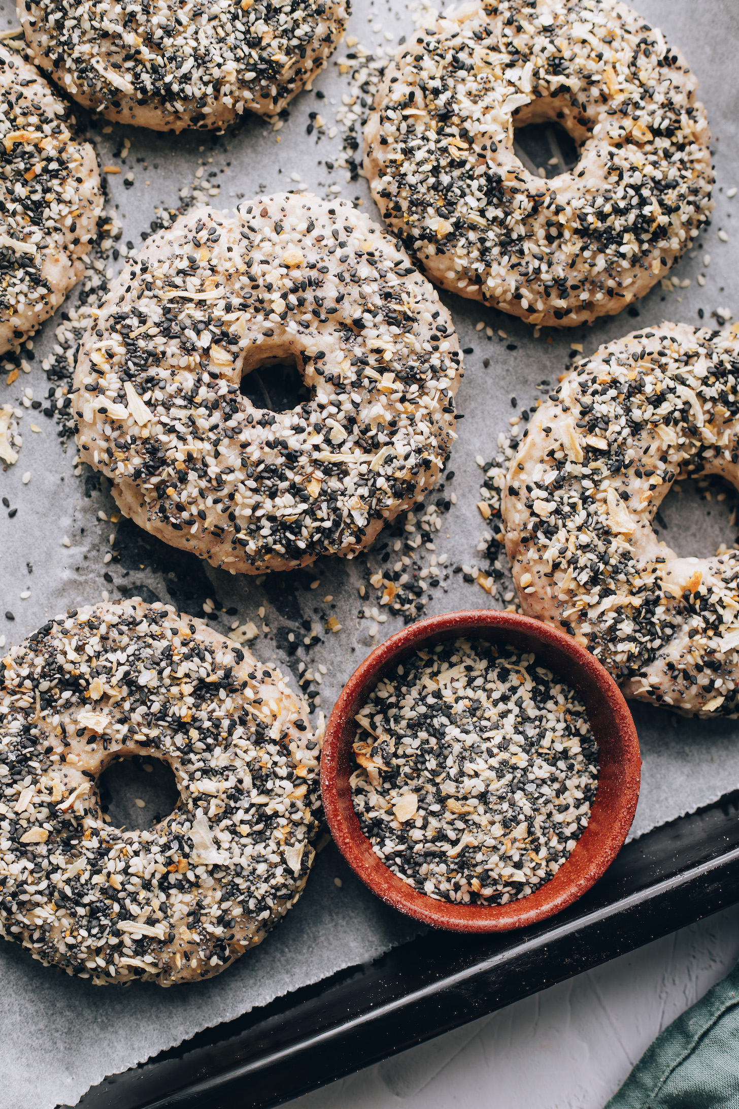 Homemade gluten-free bagels sprinkled with everything bagel seasoning