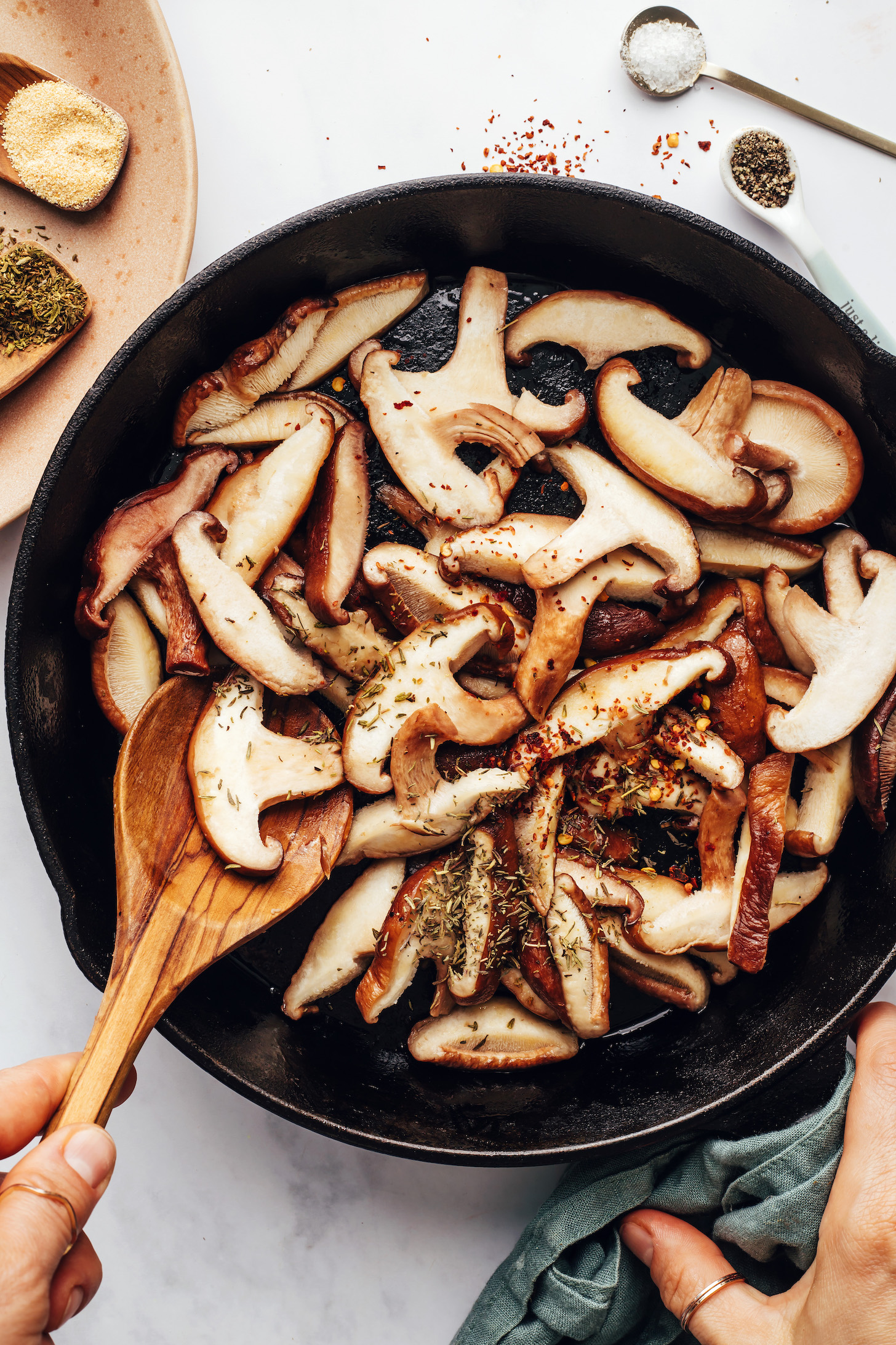 Sautéing shiitake mushrooms in a cast iron skillet