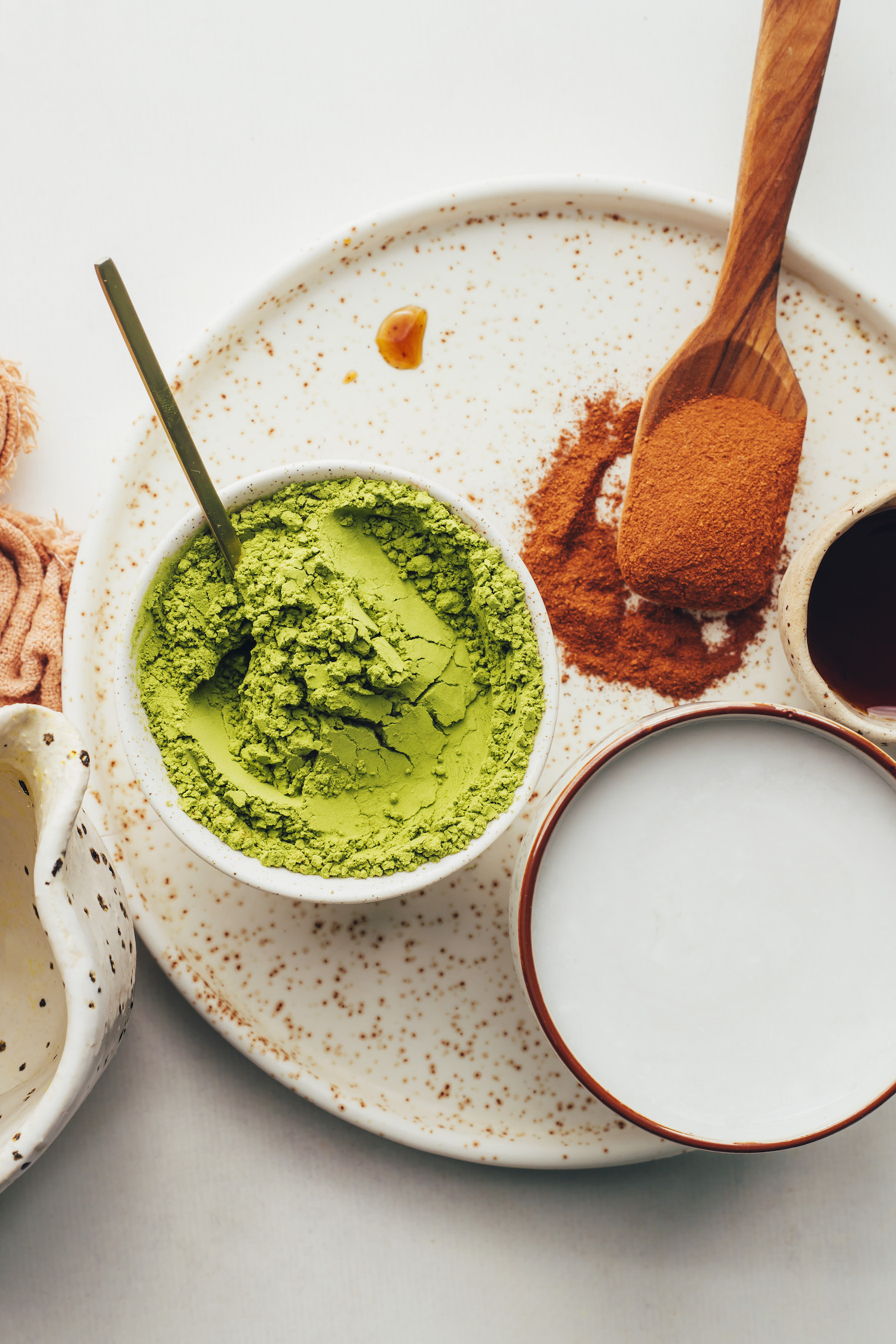 Coconut milk, maple syrup, pumpkin pie spice, matcha powder, and water