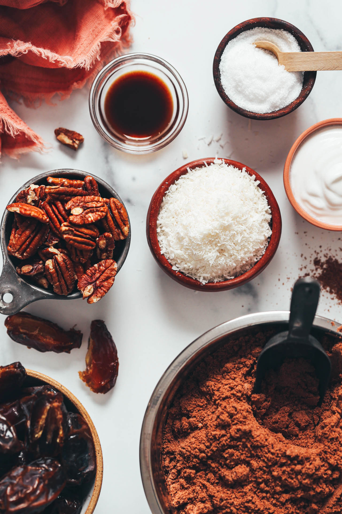 Salt, coconut cream, shredded coconut, vanilla, pecans, dates, and chocolate cake mix