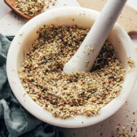 Homemade dukkah seasoning in a mortar and pestle