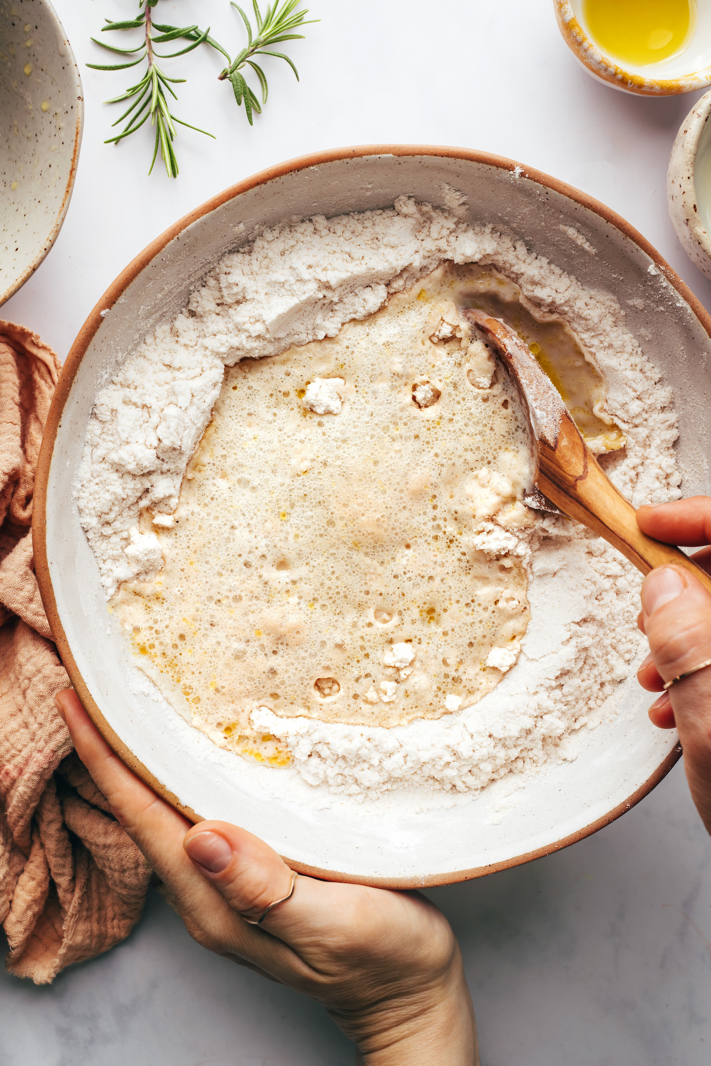 Stirring wet and dry ingredients in a bowl