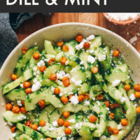 Bowl of vegan and gluten-free cucumber salad with fresh dill and mint