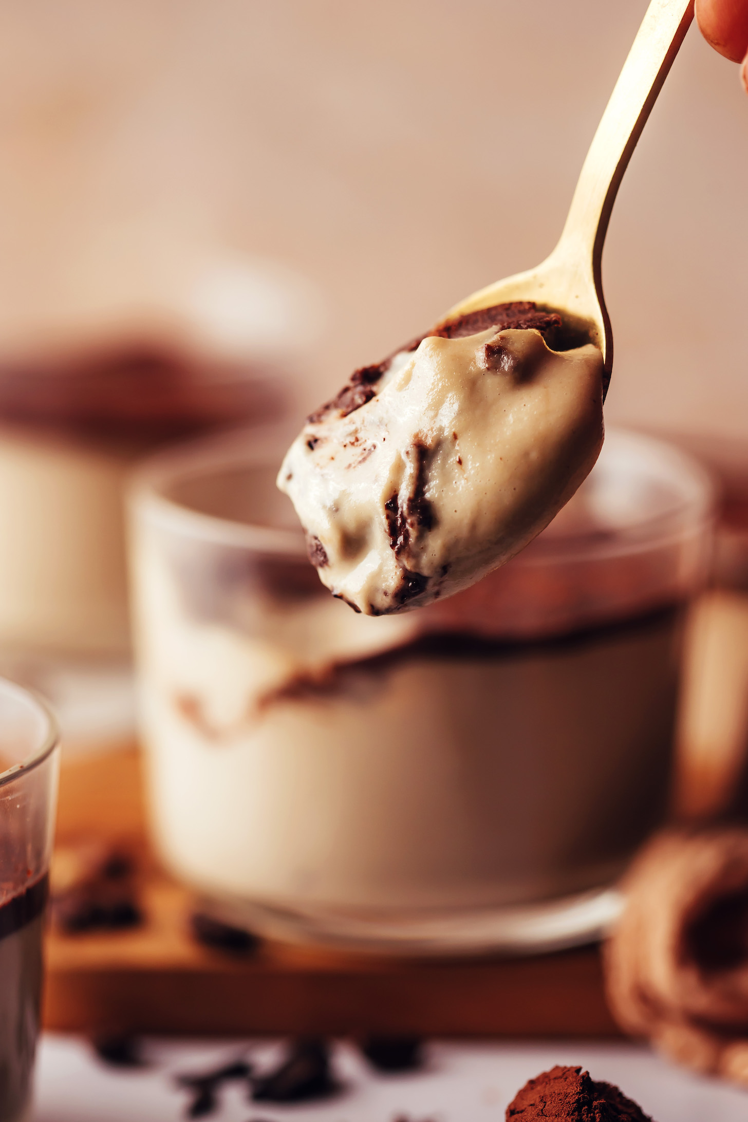 Close up shot of a spoonful of creamy tiramisu pudding