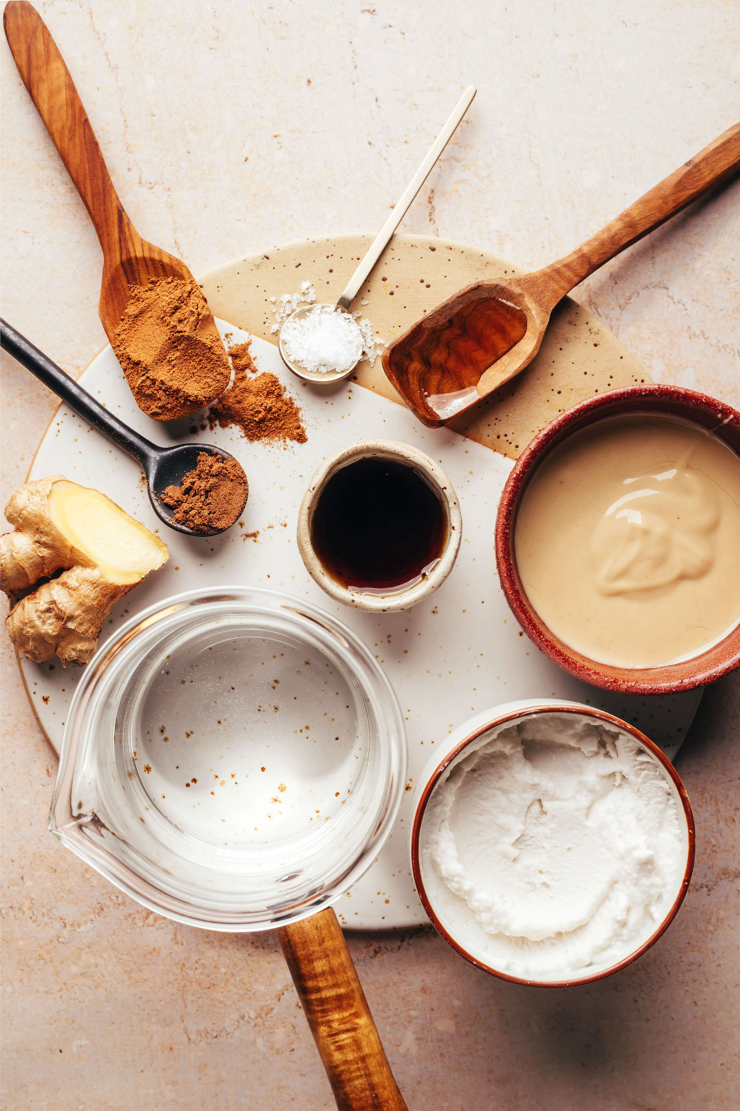 Ginger, water, coconut milk, cashew butter, vanilla, maple syrup, salt, nutmeg, and cinnamon