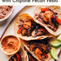 Platter of portobello fajitas with chipotle pecan pesto