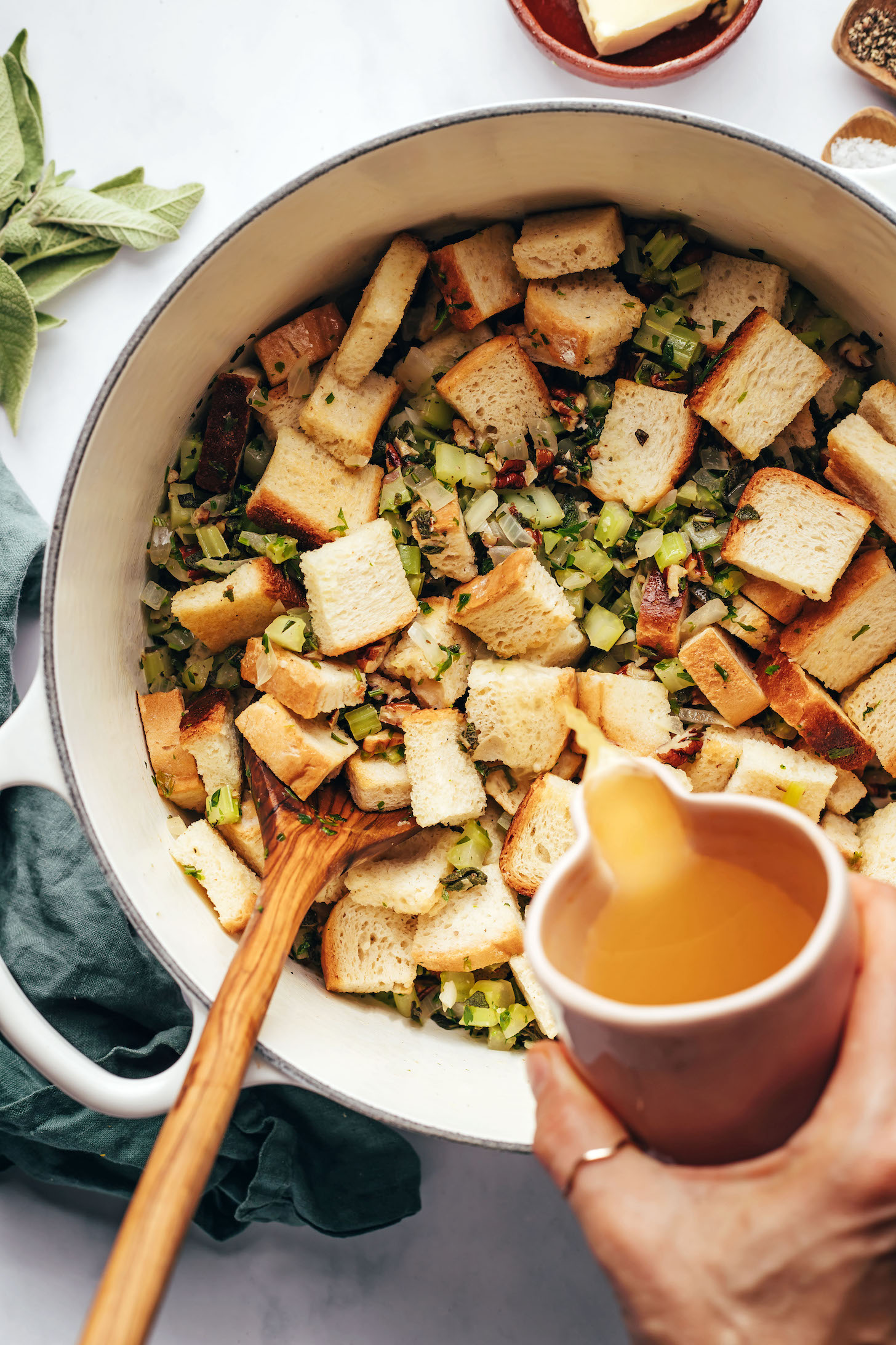Pour broth over bread and sautéed veggies