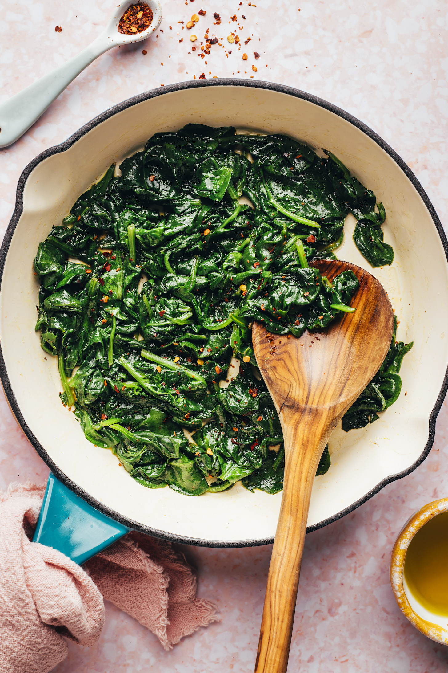 Sautéed spinach in an enameled cast iron skillet
