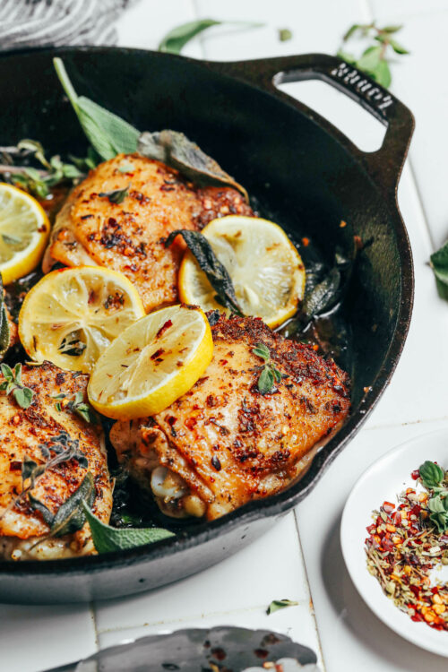 Pan of lemon and herb roasted chicken thighs