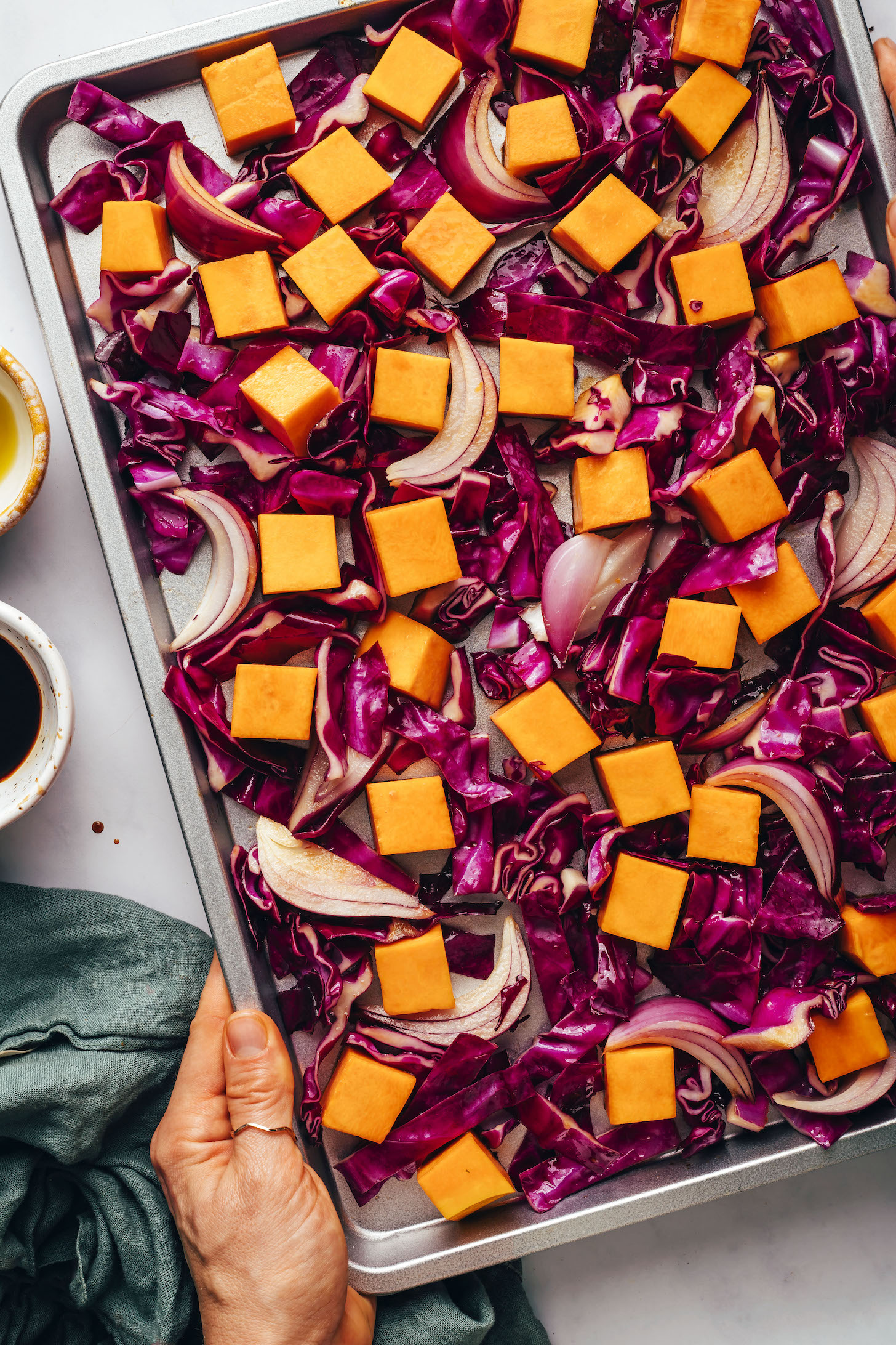 Cubed butternut squash and sliced red onion and butternut squash