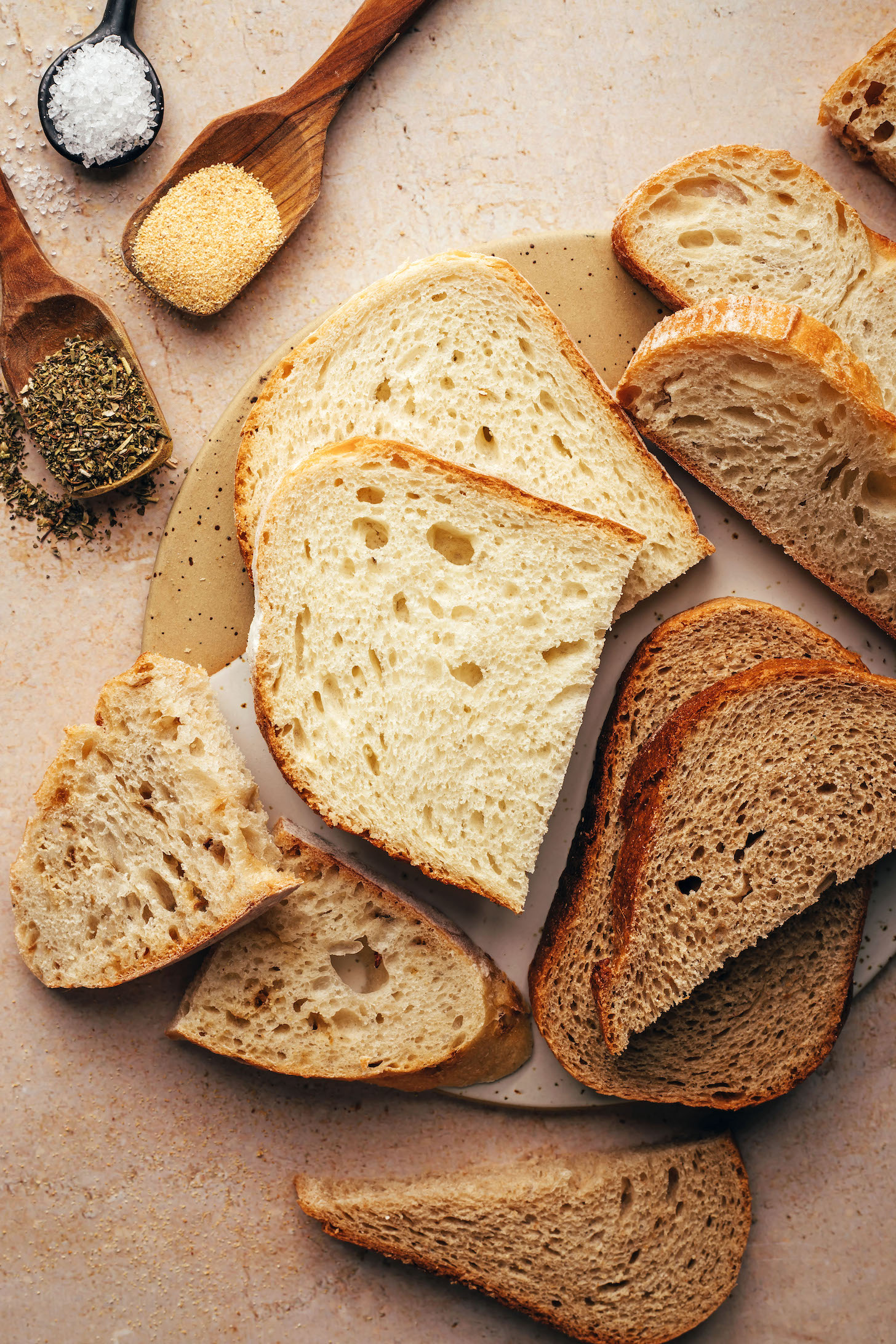 Salt, dried Italian herbs, garlic powder, and different types of bread