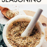 Mortar and pestle with homemade dukkah seasoning