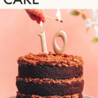 Lighting a candle on our vegan gluten-free German Chocolate Cake