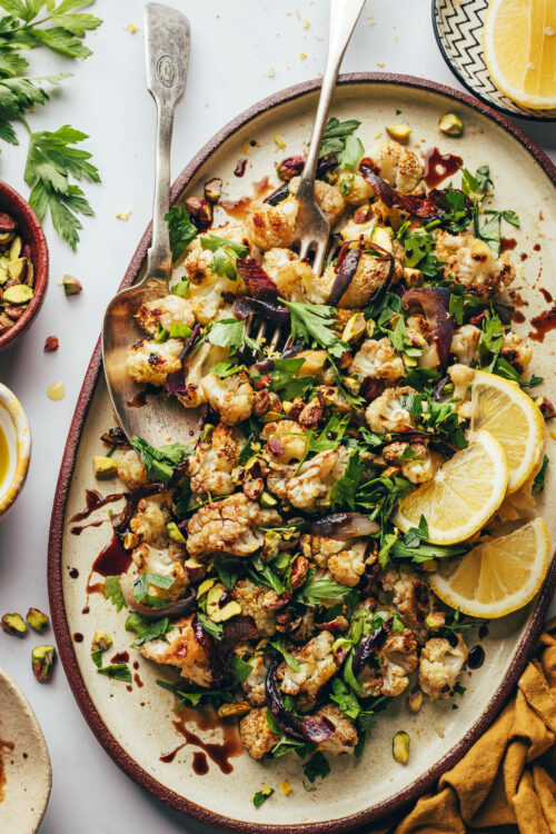 Large serving platter of our Mediterranean-inspired roasted cauliflower salad