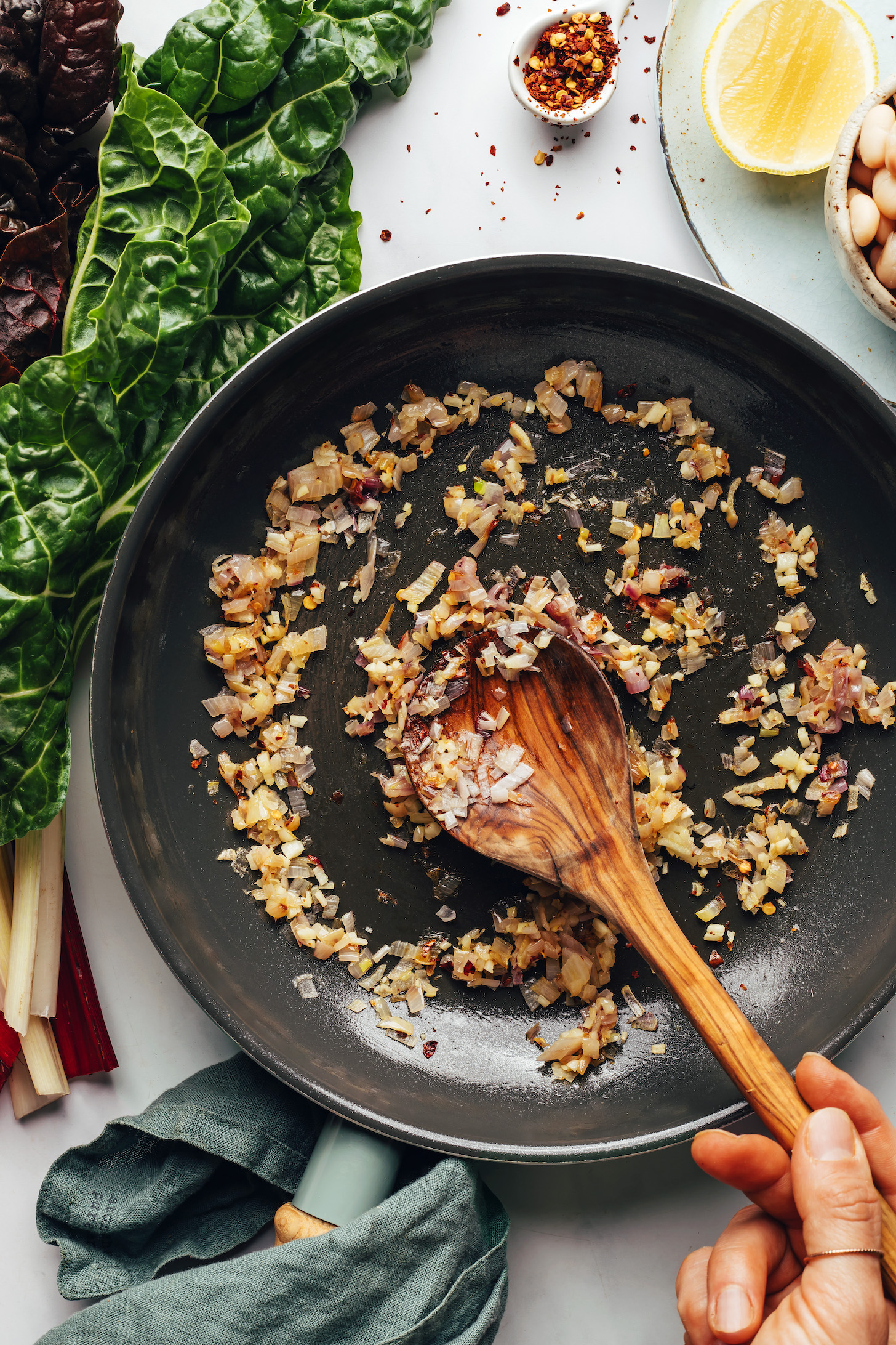 Sautéing shallot and garlic in a skillet