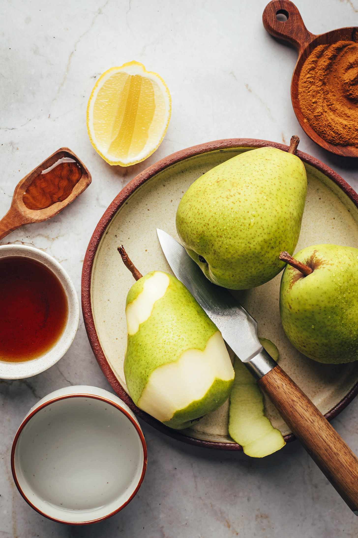 Cinnamon, firm pears, water, maple syrup, vanilla, and lemon