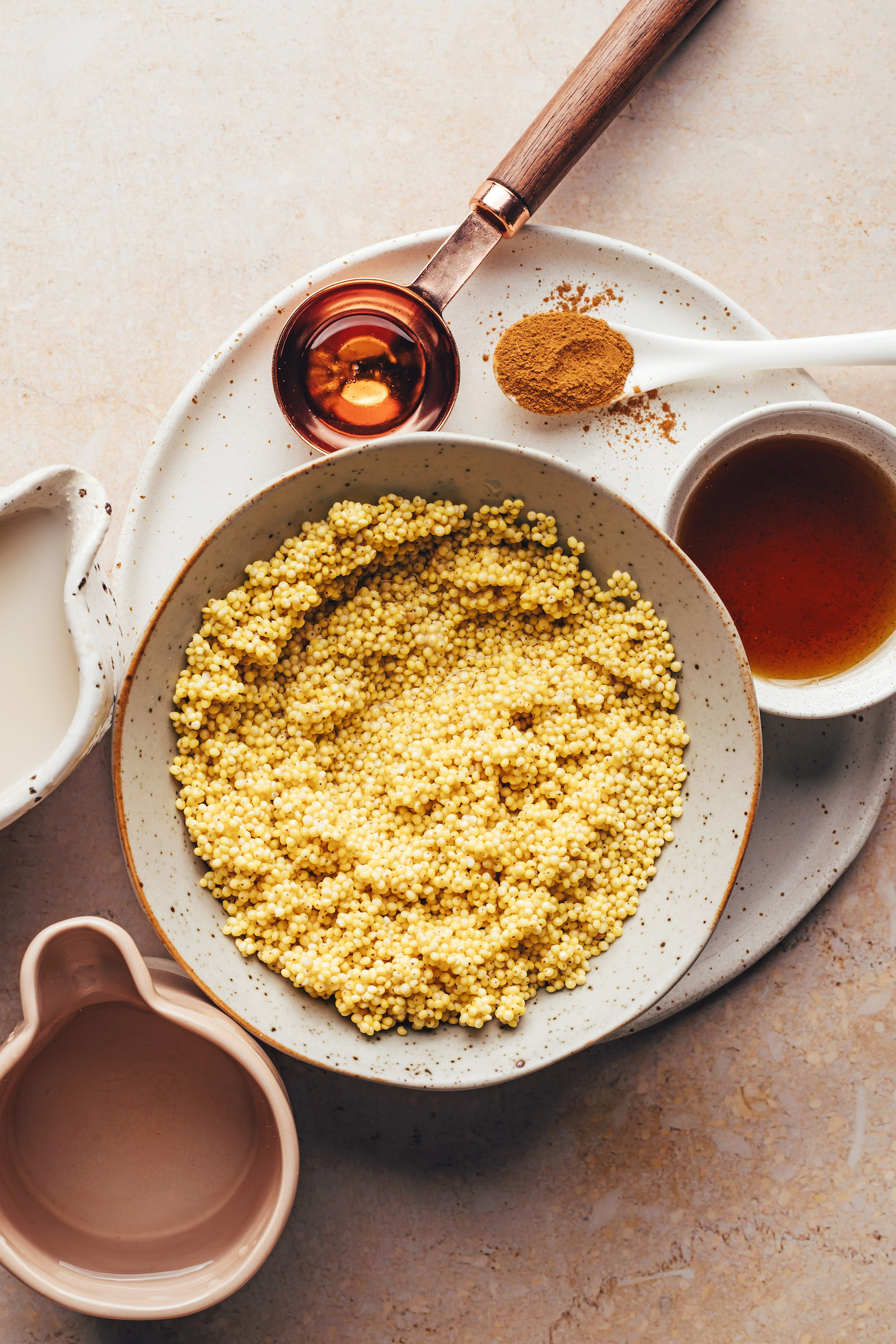 Whole grain millet, maple syrup, cinnamon, vanilla, dairy-free milk, and water