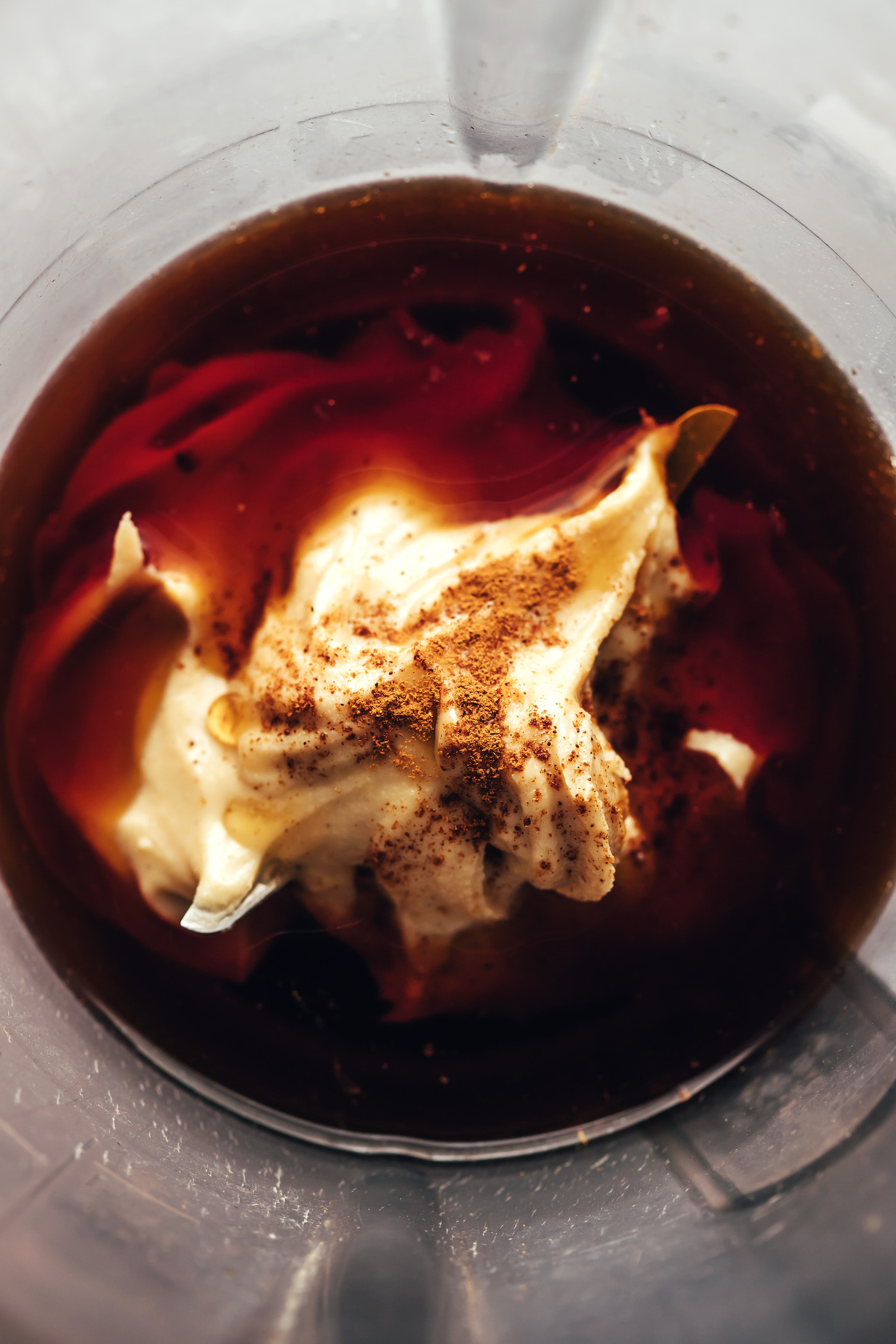 Brewed Teeccino, cashew butter, maple syrup, vanilla, and cinnamon in a blender