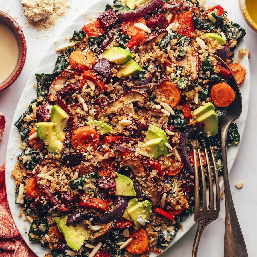 Large platter filled with our quinoa, kale, and roasted vegetable winter salad