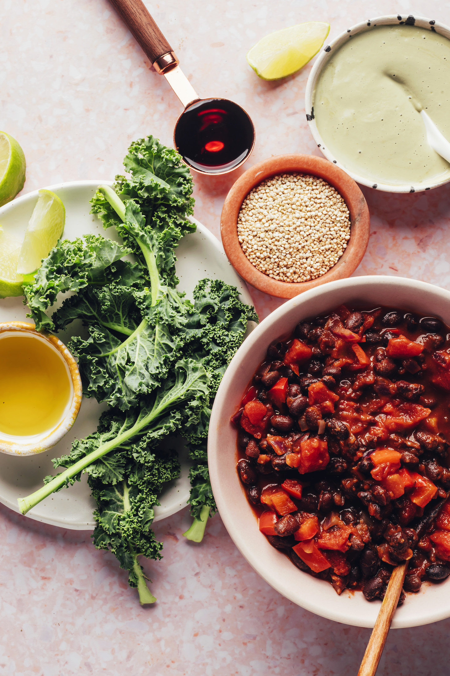 Kale, chili, cashew jalapeno sauce, quinoa, maple syrup, olive oil, and limes