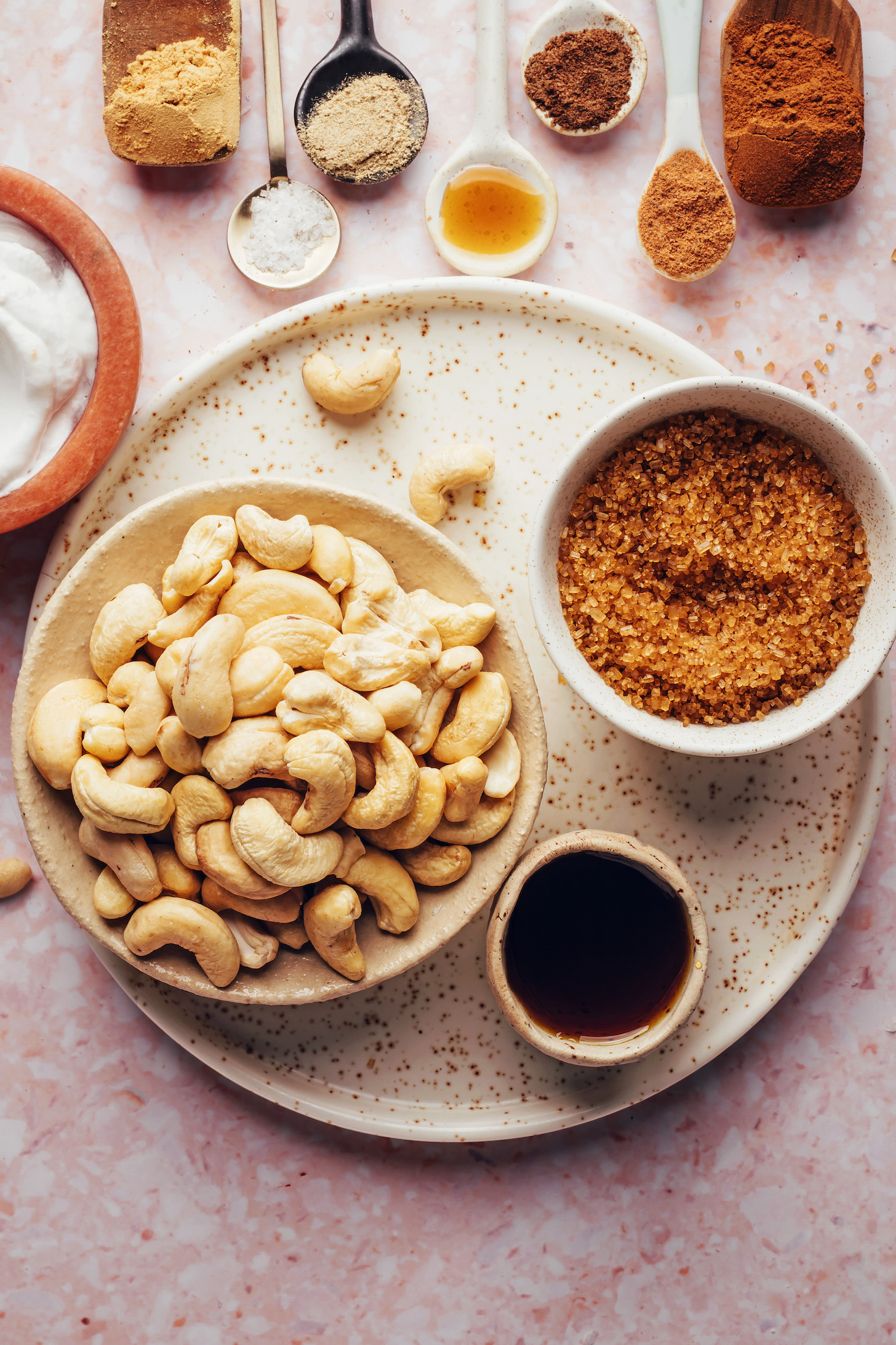 Spices, salt, vanilla, coconut milk, cashews, maple syrup, and cane sugar
