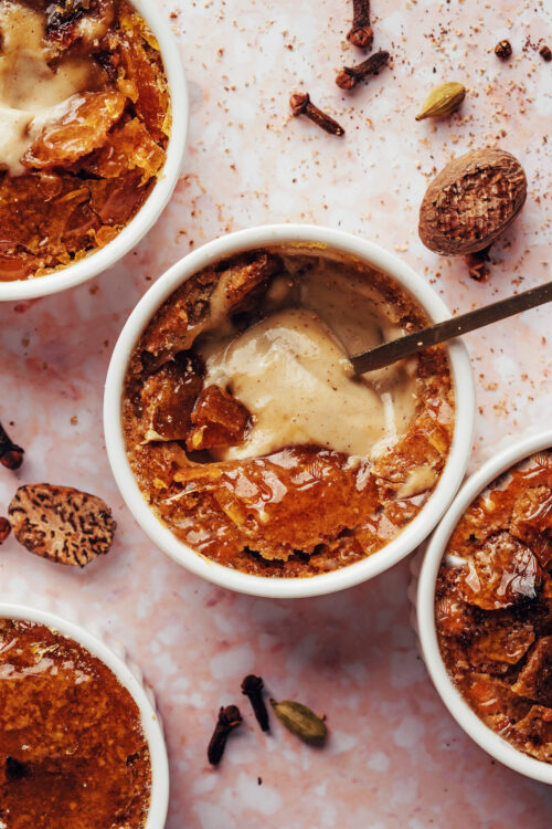 Ramekins of vegan creme brulee with chai spices