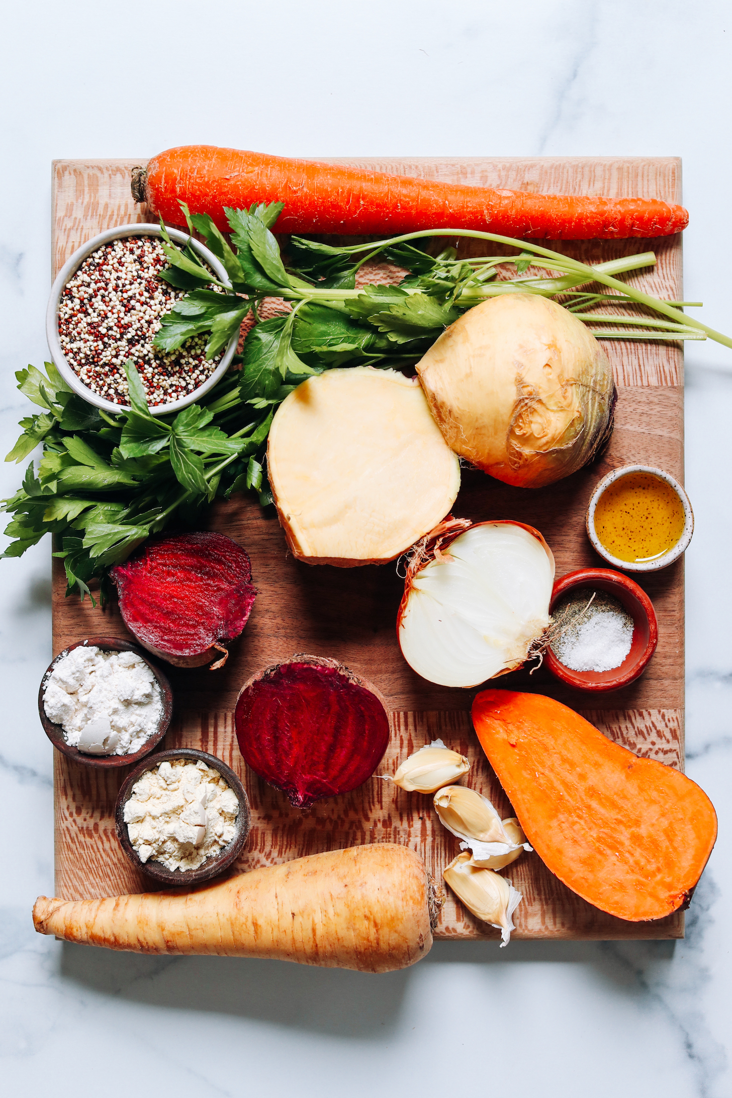Carrots, quinoa, parsley, rutabaga, beets, garlic, sweet potato, chickpea flour, gluten-free flour blend, salt, pepper, and olive oil