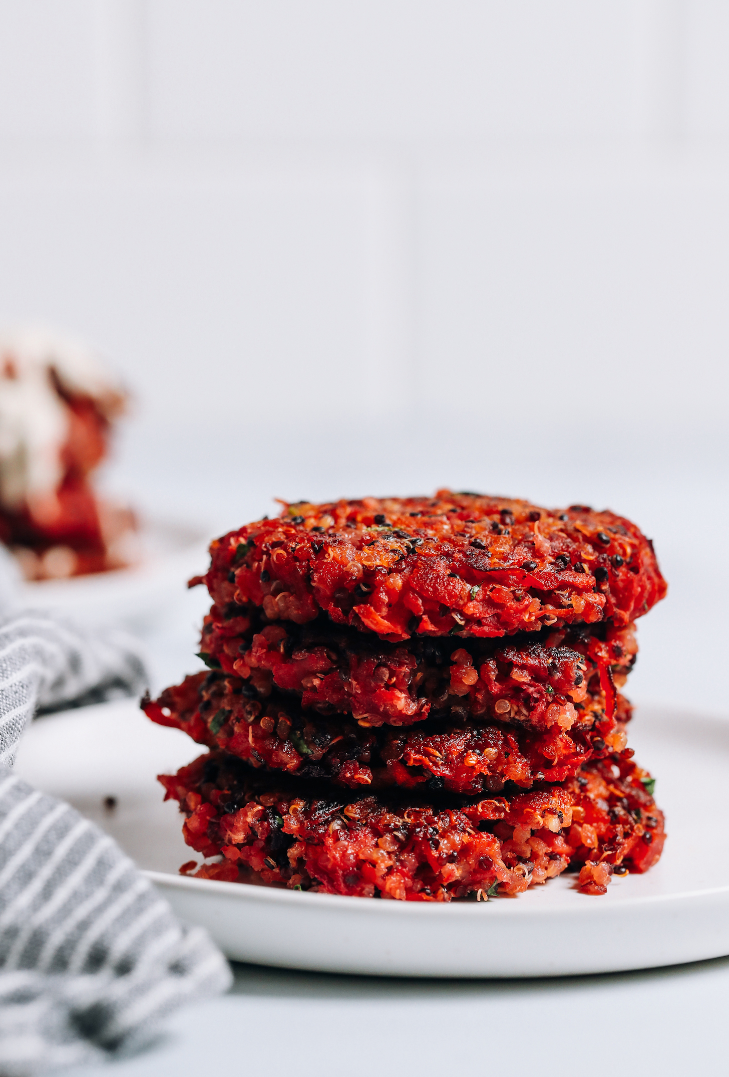 Stack of crispy quinoa root vegetable fritters