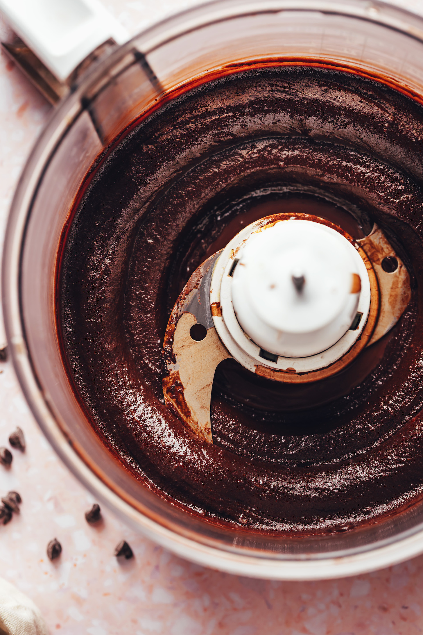 Fudgy chocolate mixture in a food processor