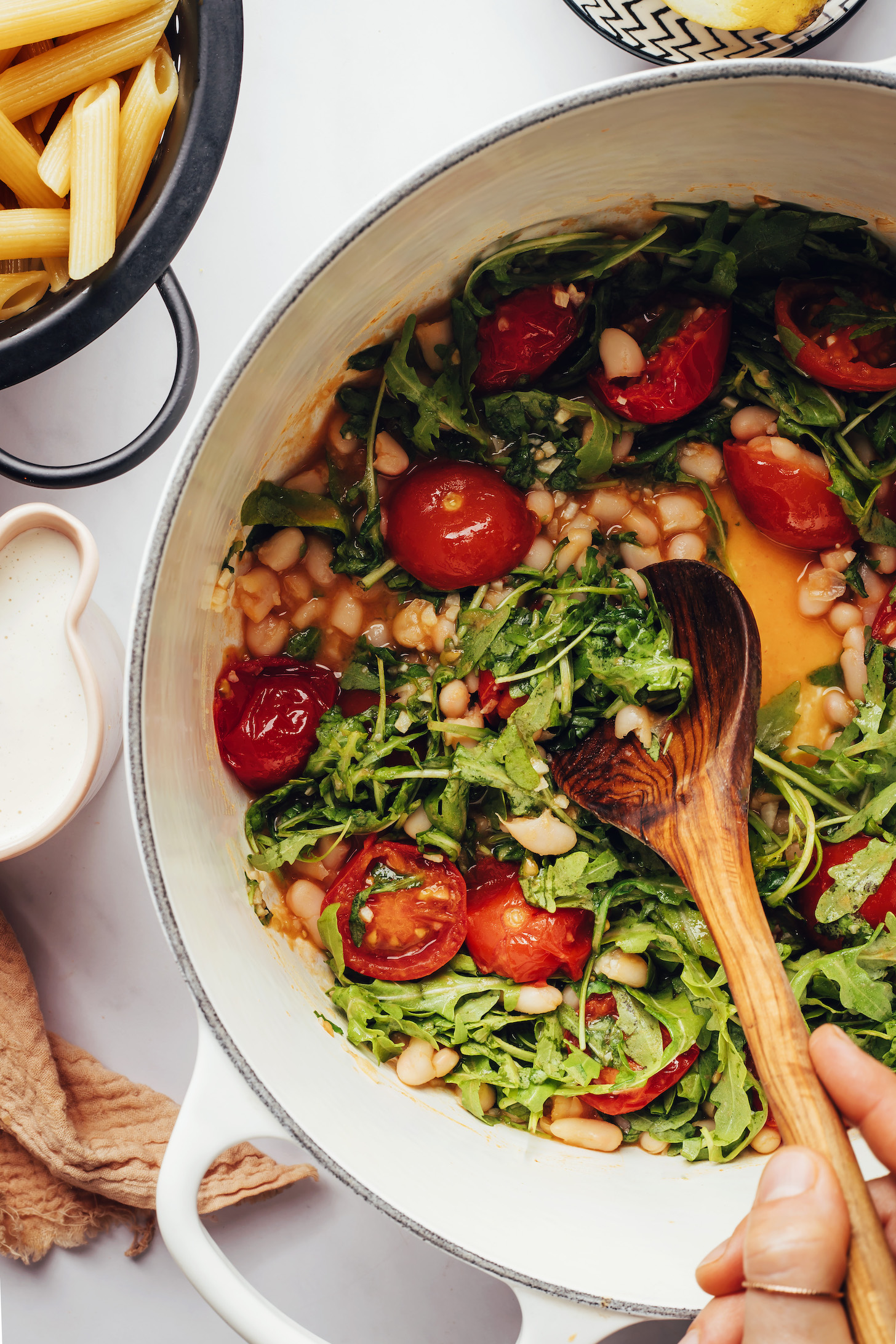 Saucy white beans, tomatoes, and arugula