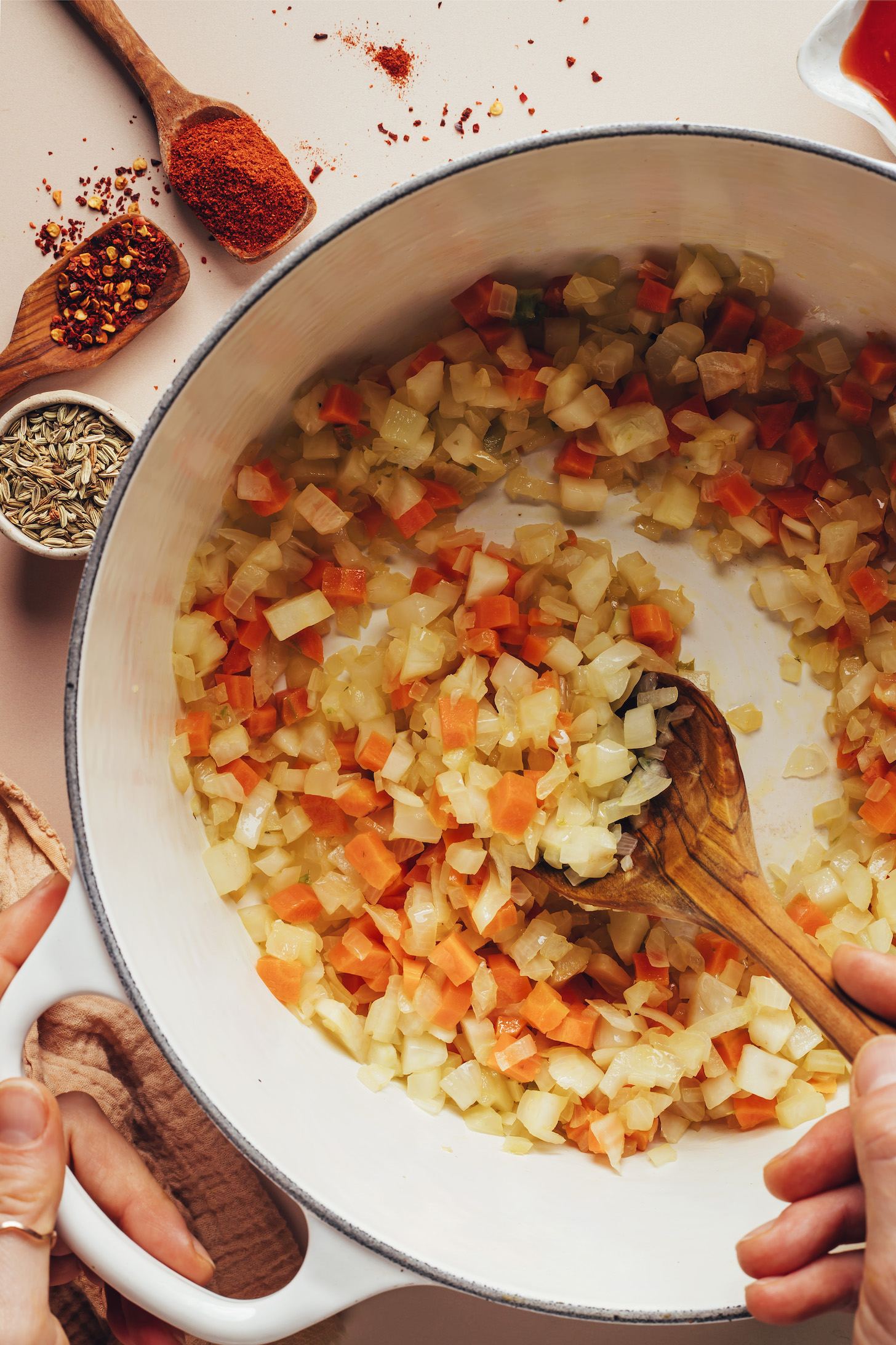Sautéing onion, fennel, and carrot in a Dutch oven