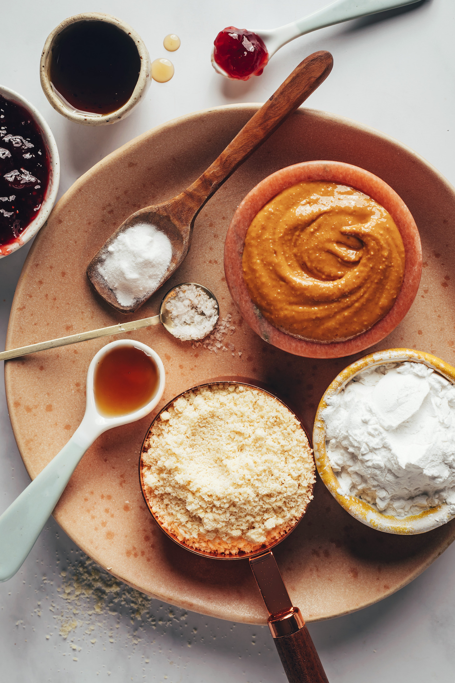 Jam, maple syrup, vanilla, salt, baking soda, peanut butter, tapioca starch, and almond flour