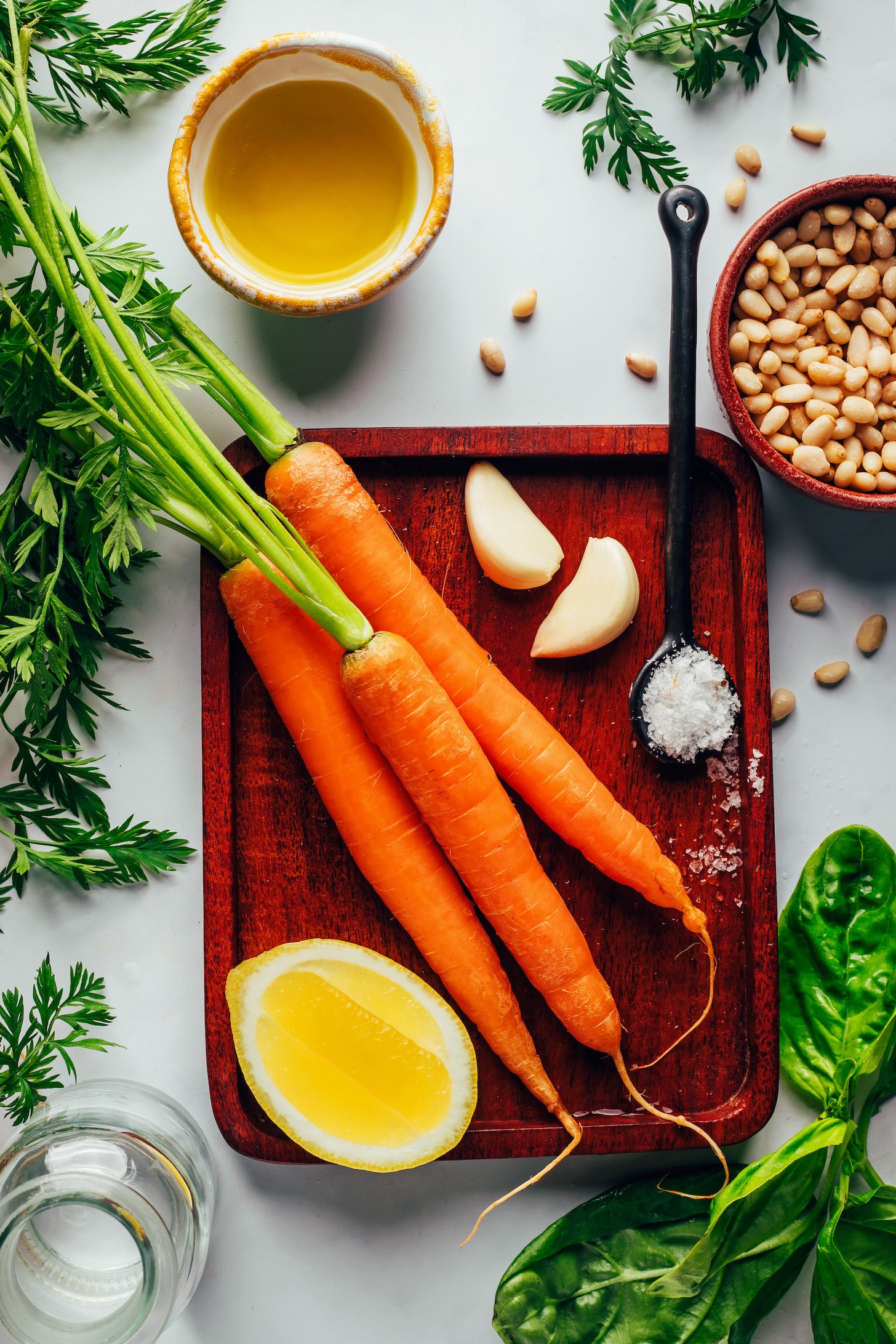 Carrots, lemon, garlic, water, salt, olive oil, pine nuts, and basil