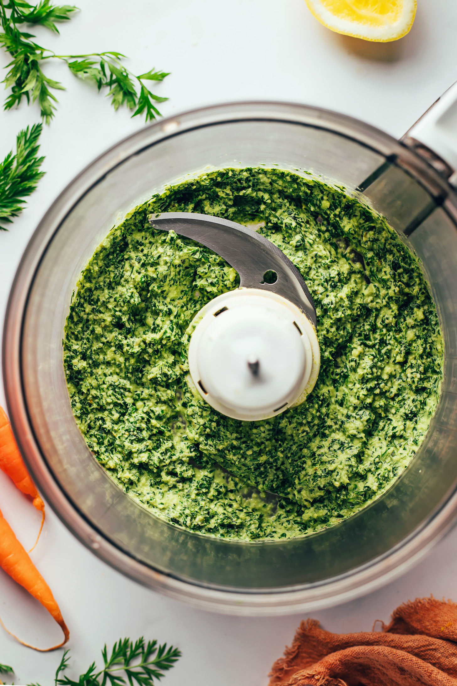 Carrot top pesto in a food processor